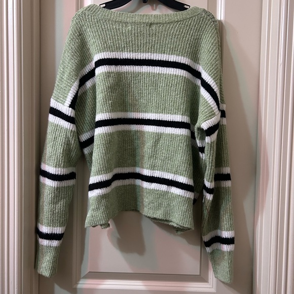 green, white, and black knit sweater. - Picture 2 of 2